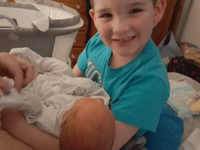James Sanderson-Blackburn said: "My two beautiful boys."