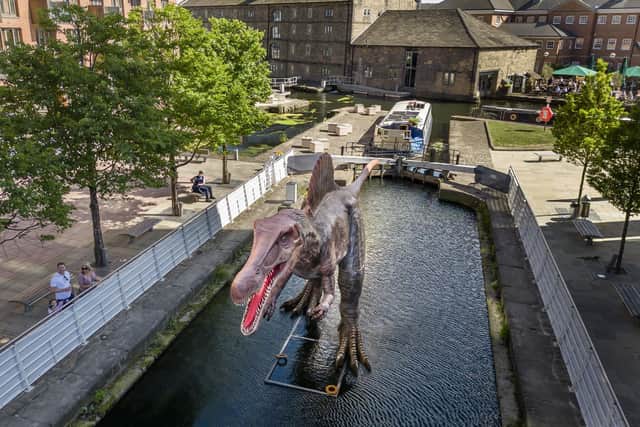The animatronic Spinosaurus that has taken up residence at Granary Wharf for this summer's Leeds Jurassic Trail. Picture: Danny Lawson/PA Wire