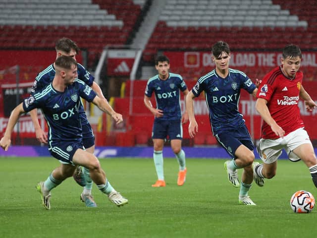 'REAL POTENTIAL': Seventeen-year-old Leeds United midfielder Charlie Crew, second right, pictured chasing Manchester United's Daniel Gore in August's Premier League 2 clash at Old Trafford. Photo by John Peters/Manchester United via Getty Images.