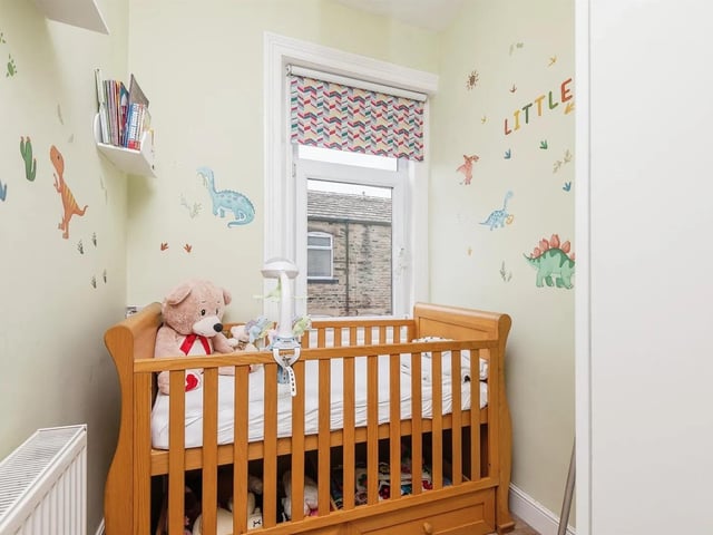 The smaller third bedroom makes for the perfect nursery or home office space.