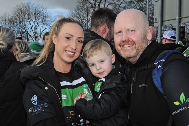 Dave Bray, who organised the walk, with Josh Parle's partner Emma Brown and the couple's son Charlie, aged three.