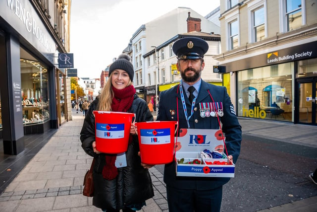 More than 50 service personnel came to Leeds to join forces with veterans and volunteers in one of the biggest street cash collections of its kind in Europe. Pictured are Katie Rufus, from Tetra Tech, and Sgt Amphlett, from 90 Signals Unit is based at RAF Leeming.