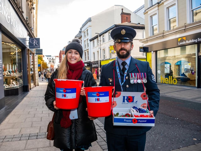 More than 50 service personnel came to Leeds to join forces with veterans and volunteers in one of the biggest street cash collections of its kind in Europe. Pictured are Katie Rufus, from Tetra Tech, and Sgt Amphlett, from 90 Signals Unit is based at RAF Leeming.