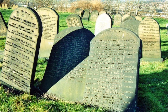 Guinea graves in Holbeck Cemetery. As many as 46 names are listed on a single tombstone. There are many 'guinea graves' dating from 1857 to the 1940s.