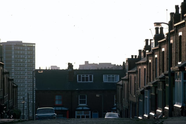 Looking south down Glossop Terrace towards Rider Road in January 1976. In the background, left, are the high-rise flats of Holborn Towers.