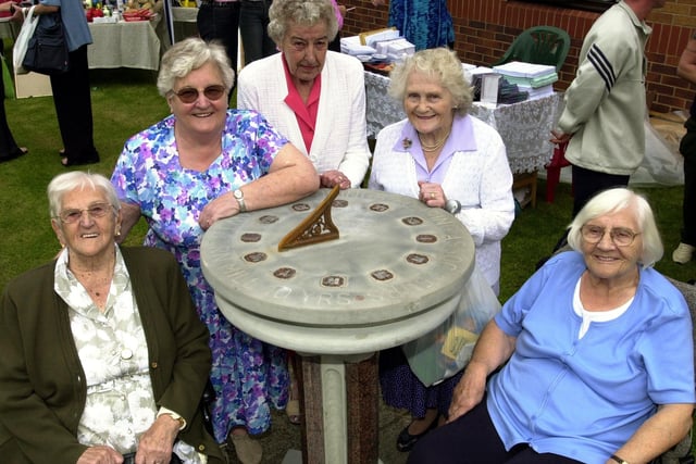 Ladies at the sun dial to mark the 10th anniversary of the Hawthorn Mill housing complex in Lower Wortley. Pictured, from left, are Lillian Wilson, Gwyneth Lawton, Doris Swan, Kathleen Downes and Majorie Messenger.