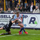 Jack Broadbent scores for Rhinos away to Castleford in 2021. Picture by Bruce Rollinson.