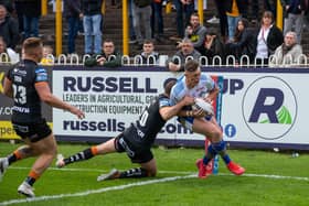 Jack Broadbent scores for Rhinos away to Castleford in 2021. Picture by Bruce Rollinson.
