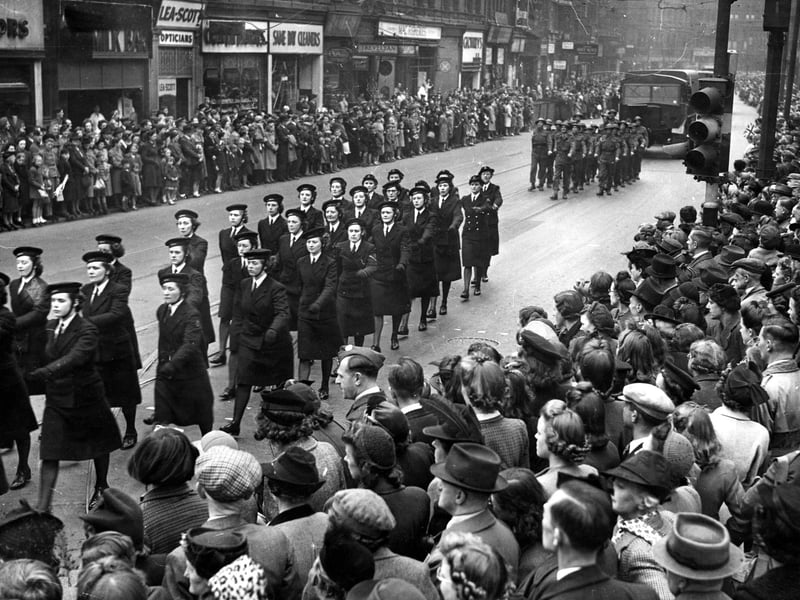 A detachment of WRENS marching along Boar Lane on the route to Leeds Town Hall. This was part of the military parade on the opening day of Salute The Soldier week.