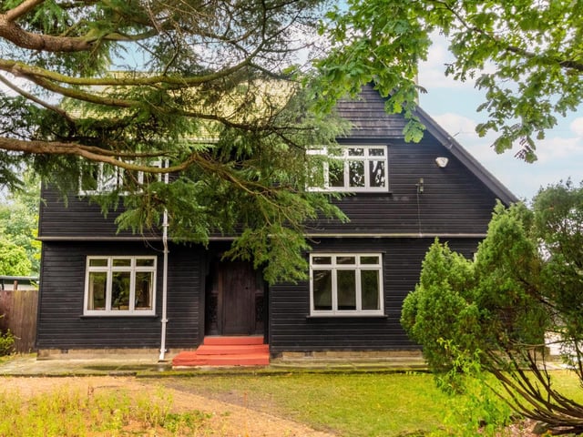 Tucked away down a private country lane within the St John’s Conservation Area, this elegant cedar-built home redefines uniqueness with its beautiful natural views and delightful gardens.