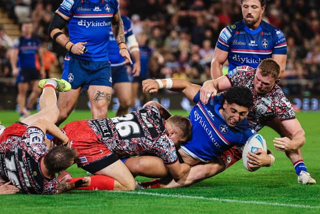 Emre Guler in regular-season action for Wakefield Trinity at Leigh Leopards. Picture by Alex Whitehead/SWpix.com.