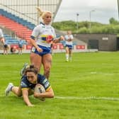 Ruby Enright, seen scoring against Warrington at the recent Nines tournament, has been named in Rhinos' Wembley squad after an injury scare. Picture by Olly Hassell/SWpix.com.