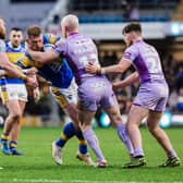 Tom Holroyd, seen in action against Wigan Warriors, has been named in Leeds Rhinos' 21-man squad to face Catalans Dragons after eight games on the casualty list. Picture by Alex Whitehead/SWpix.com
