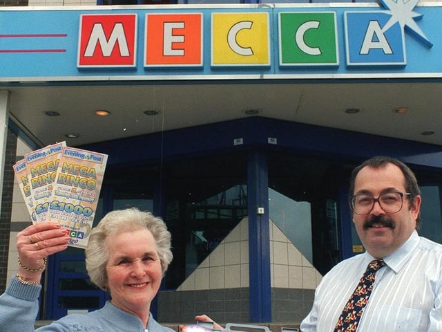 Yorkshire Evening Post Mega Bingo winner Doreen Howson from Garforth  is presented with her £1,000 win by Mike Jenkins, manager of Mecca Bingo Club in Crossgates.