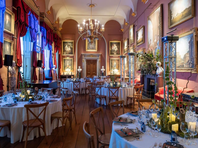 The Long Gallery of Castle Howard decorated with autumnal arrangements by event-designer Charlotte Lloyd-Webber