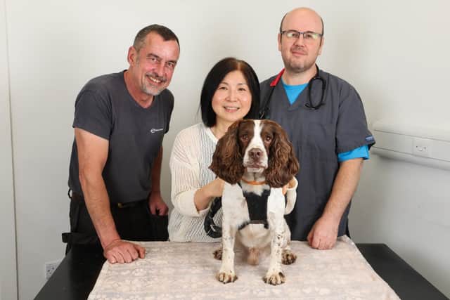 Quentin the dog received life saving treatment for lungworm at Chantry Vets in Wakefield. He is pictured with clinical director Fraser Reddick and his owners Mark and Rieko Gibson.