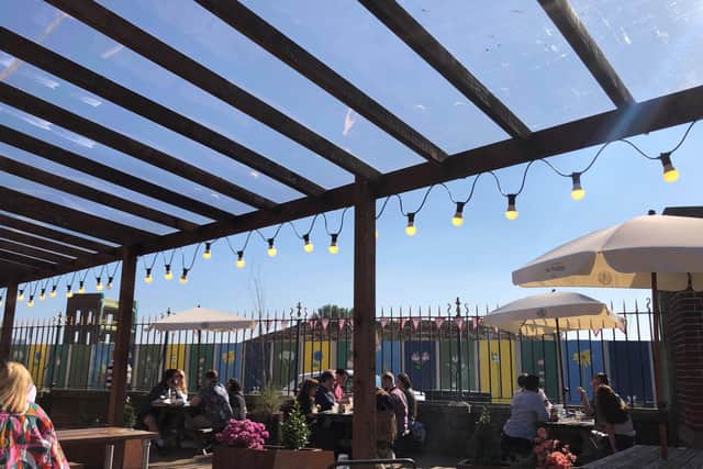 The beer garden was bright and colourful in the sunshine.