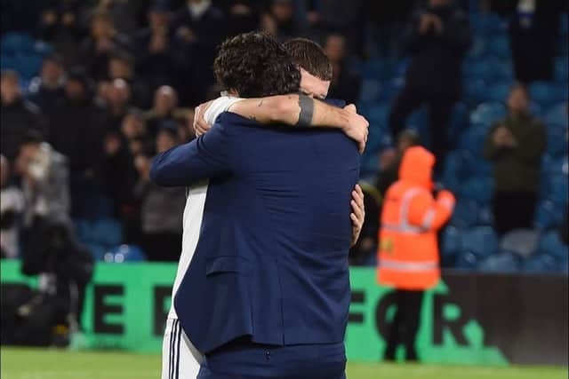 Mateusz Klich embraces Victor Orta at Elland Road (Pic: @cli5hy / Instagram)