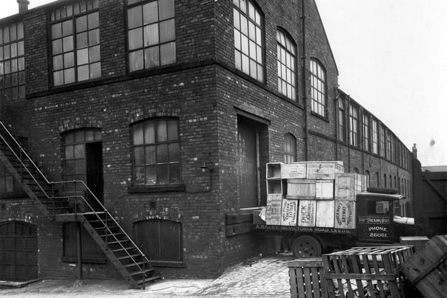 A view showing yard and packing area of the Co-operative Wholesale Society Ltd, Brush factory which was at 2 Belle Isle Road. Pictured in September 1935