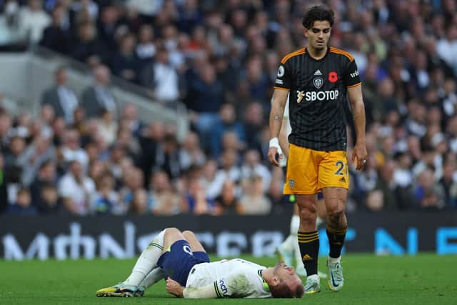 VERSATILE: Leeds United's Pascal Struijk, right, pictured in this month's Premier League clash against Tottenham Hotspur in which he battled it out with Harry Kane, pictured on the floor. Photo by ISABEL INFANTES/AFP via Getty Images.