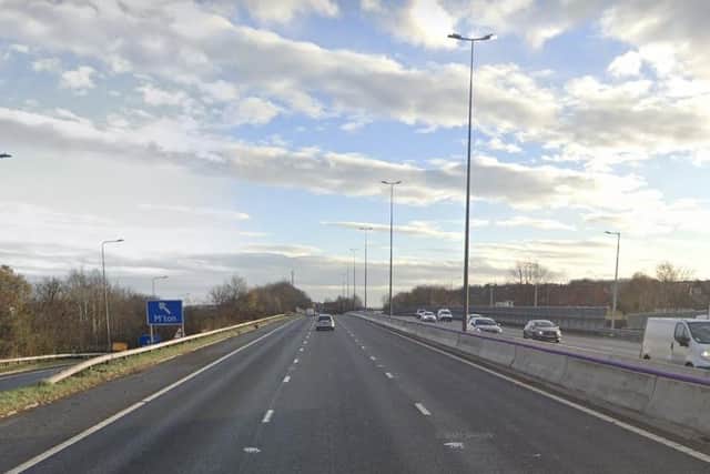 Police were alerted to reports of a woman on the wrong side of the railings on a footbridge over the M621 near junction six for Belle Isle Road. Image: Google Street View