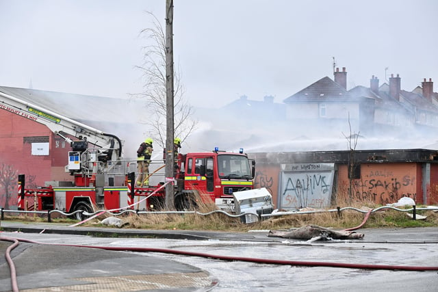 Fire crews attend the fire at the deserted youth club in Arum Street, Bradford.