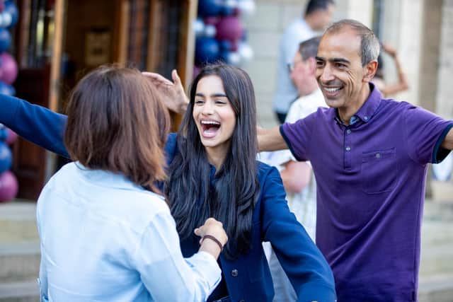 Ayesha Razak celebrates her fantastic A Level grades with her parents