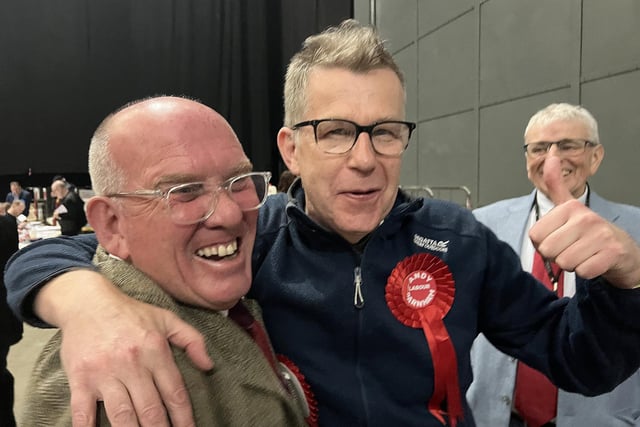 Newly-elected Labour Couns Adrian McCluskey and Andy Parnham celebrate taking the Farnley and Wortley and the Armley wards off the Green Party