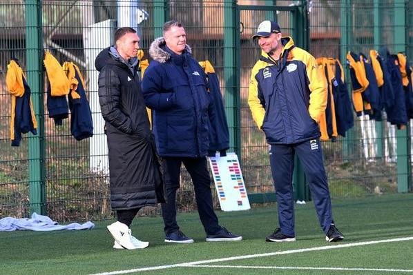 Former Rhinos captain Kevin Sinfield, now part of the England rugby union coaching staff, watched Rhinos train, alongside club commercial director Rob Oates, middle and coach Rohan Smith, right.