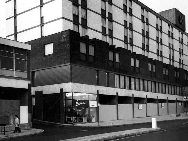 Shop units on the ground floor of the newly opened Merrion Hotel in January 1966 are being advertised as to let; only the one on the corner is so far occupied. These are all part of the Merrion Centre development.