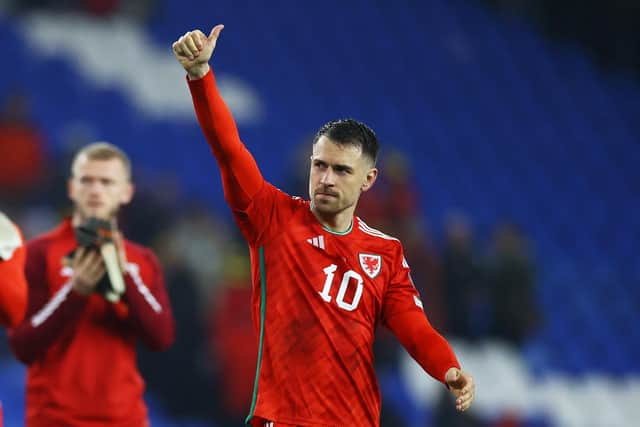 CARDIFF, WALES - MARCH 28: Aaron Ramsey of Wales acknowledges the fans after the team's victory during the UEFA EURO 2024 qualifying round group D match between Wales and Latvia at Cardiff City Stadium on March 28, 2023 in Cardiff, Wales. (Photo by Michael Steele/Getty Images)