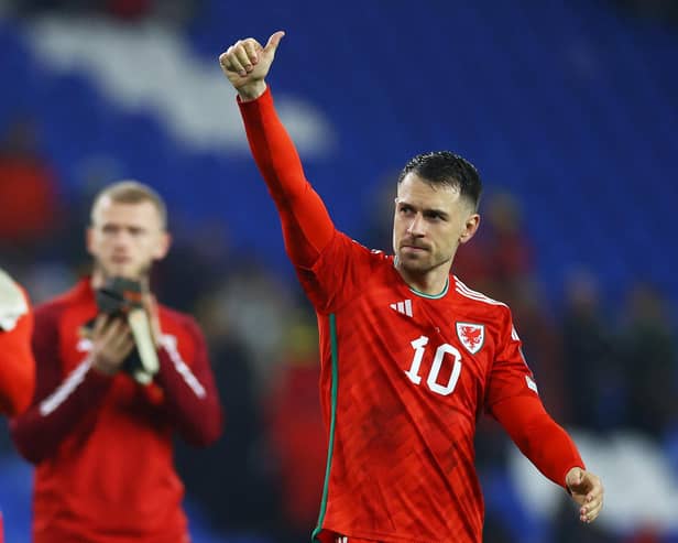 CARDIFF, WALES - MARCH 28: Aaron Ramsey of Wales acknowledges the fans after the team's victory during the UEFA EURO 2024 qualifying round group D match between Wales and Latvia at Cardiff City Stadium on March 28, 2023 in Cardiff, Wales. (Photo by Michael Steele/Getty Images)