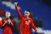 CARDIFF, WALES - MARCH 28: Aaron Ramsey of Wales acknowledges the fans after the team's victory during the UEFA EURO 2024 qualifying round group D match between Wales and Latvia at Cardiff City Stadium on March 28, 2023 in Cardiff, Wales. (Photo by Michael Steele/Getty Images)