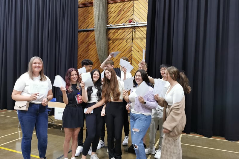 Happy students receiving their results