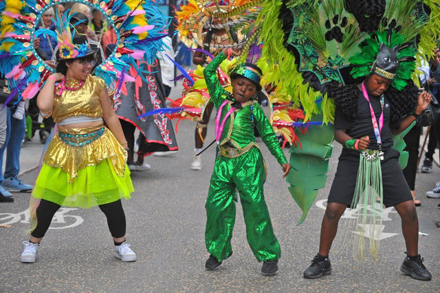 Following in the footsteps of the iconic August bank holiday extravaganza, Leeds West Indian Carnival troupes put on pop-up performances throughout the day
