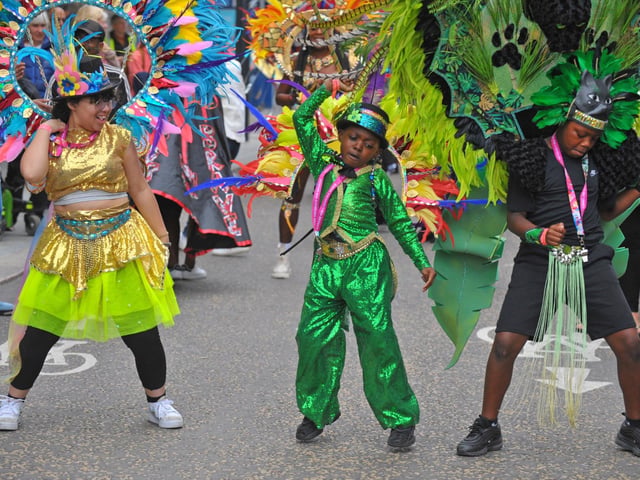 Following in the footsteps of the iconic August bank holiday extravaganza, Leeds West Indian Carnival troupes put on pop-up performances throughout the day