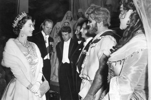 Members of the cast of the Covent Garden opera 'Samson' are presented to the Queen on stage after the performance at Leeds Grand Theatre in October 1958.