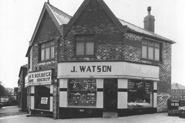 John Watson's greengrocers shop on junction of Lower Wortley Road with Fawcett Lane in April 1936. Leeds and Holbeck building society can be seen on left.
