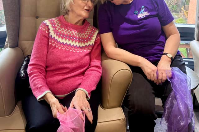 Resident with Joanne from Musical Moments at Windsor Court Care Home enjoying Travel the World with Musical Moments session