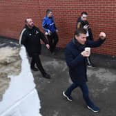 Former Leeds United head coach Jesse Marsch (C) gestures as he arrives ahead of the English FA Cup fourth round football match between Accrington Stanley and Leeds United at the Wham Stadium(Photo by PETER POWELL/AFP via Getty Images)