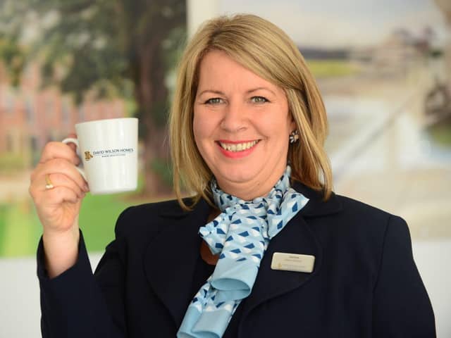 David Wilson Homes Sales Adviser Janine raises her mug of tea to the news
