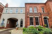 This four-bedroom character home is close to a wide range of amenities and is set over three floors.