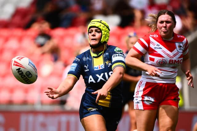 Frankie Blakey gets a pass away during Leeds Rhinos' win at St Helens last week. Picture by Olly Hassell/SWpix.com.