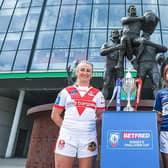 Rhinos captain Hanna Butcher and St Helens' Jodie Cunningham with the women's Challenge Cup trophy at Wembley. Picture by Kieran Cleeves/SWpix.com.