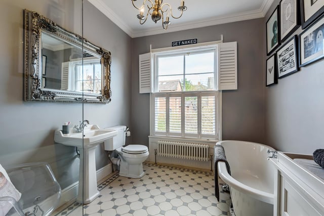 The family bathroom is fitted with an elegant four piece suite, with underfloor heating, walk-in waterfall shower and a free-standing claw foot roll-top bath.