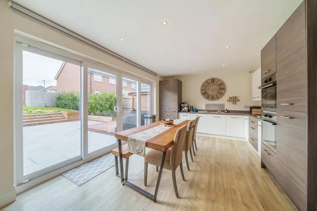 The kitchen is equipped with a range of fitted base and wall units providing ample storage, with integrated appliances such as Zanussi frost free fridge freezer, Siemens integrated dishwasher, Two AEG single ovens and gas hobs.