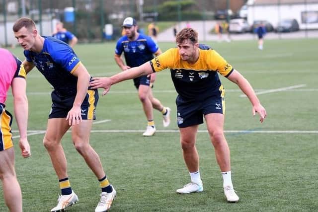 Ash Handley, left and Paul Momirovski - seen at training on Thursday - could be Rhinos' new left-wing pairing this season. Picture by Simon Hulme.
