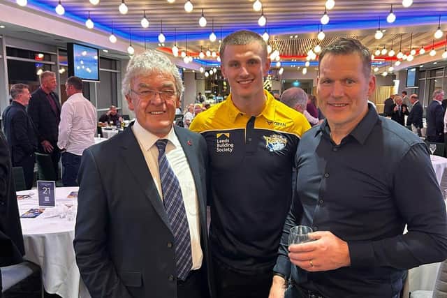 New Rhinos Players Association president Alan Smith, left, with current Leeds winger Ash Handley and Jim Fallon who starred for the club in the 1990s.