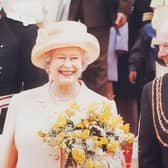 The Queen and Brian North during a visit in 2002.