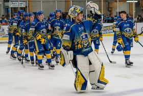 LEADING MAN: Netminder Sam Gospel acknowledges his man of the match award with his Leeds Knights team-mates behind him. Picture courtesy of Anna Alarie.